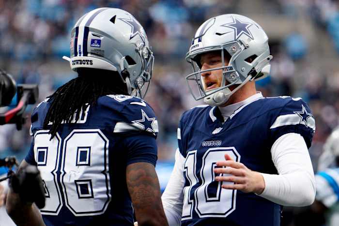 Rush gooit voor career-high 3 TD's, Cowboys forceren 4 omzet om Panthers met 30-14 te verslaan