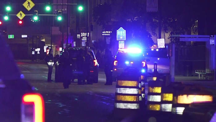 Verdachte gearresteerd na het schieten van voetgangers in argument in de binnenstad, zegt de politie