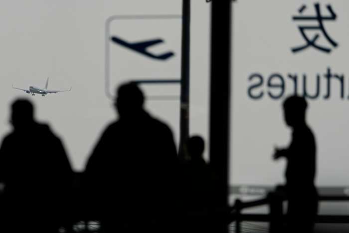 Hoge wind en zandstormen vragen Beijing om honderden vluchten te annuleren en parken te sluiten