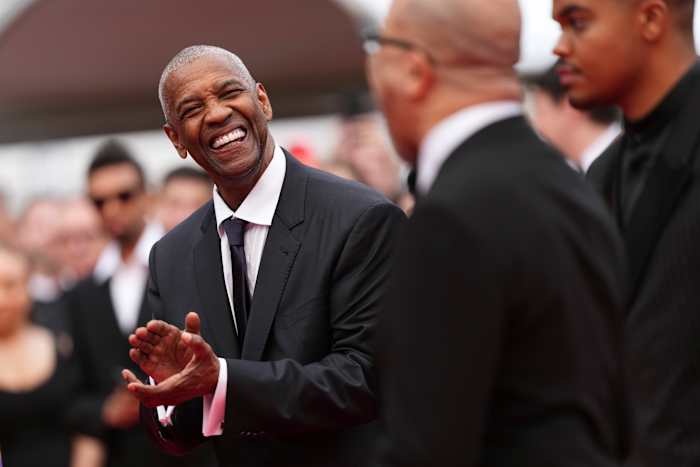 Denzel Washington ontvangt een verrassing Honorary Palme d'Or in Cannes première voor 'hoogste 2 laagste'