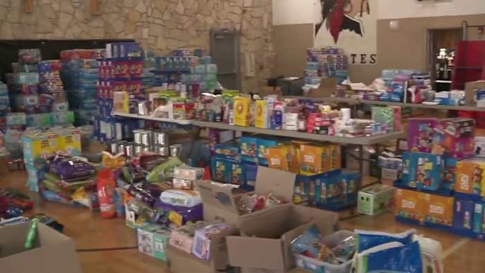 In het middenpunt bewoners mobiliseren om overstromings-getroffen vrijwillige brandweer te ondersteunen