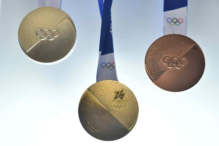 Medailles voor Olympische Spelen in Milaan-Cortina vertegenwoordigen 'twee helften die samenkomen'