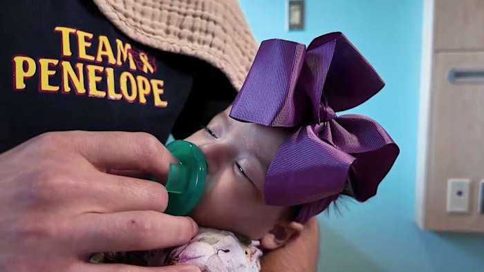 De familie San Antonio verhoogt het bewustzijn na de diagnose van de kanker van pasgeborenen