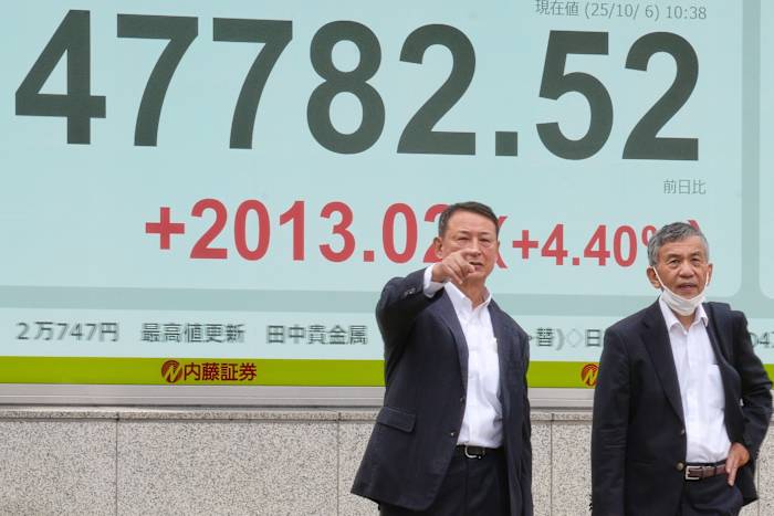 Aziatische markten meestal hoger in rustige vakantiehandel nadat AI deals push muur st tot meer records