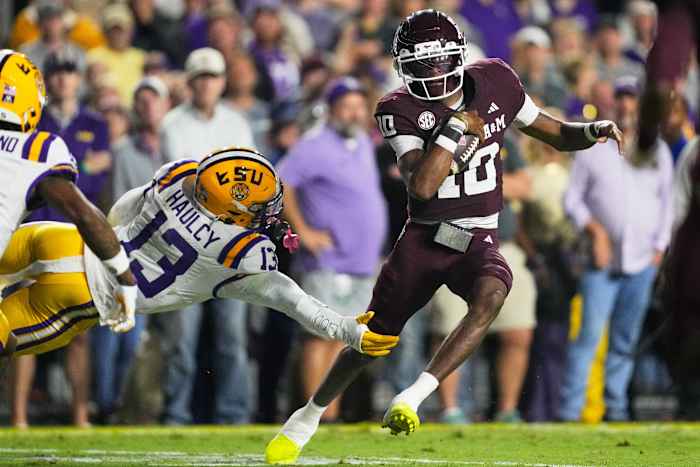 Reed produceert 4 TD's en nr. 3 Texas A&M-races verwijderd van nr. 20 LSU, 49-25