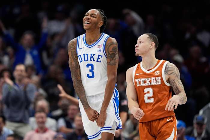 Evans en Boozer helpen nummer 6 Duke een trage start te overwinnen en Texas met 75-60 te verslaan in de seizoensopener