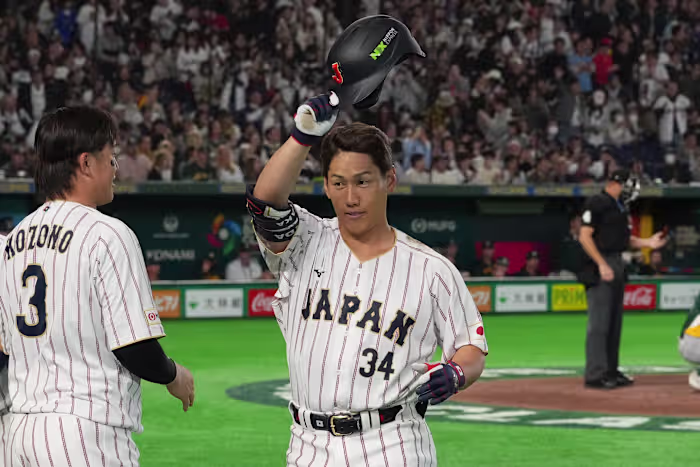 Japan komt laat tot een rally om Australië met 4-3 te verslaan en pakt de eerste plaats in de groep op de World Baseball Classic