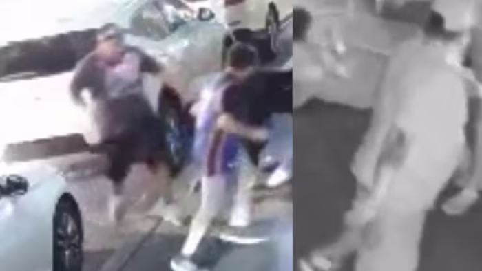 De politie zoekt hulp bij het identificeren van mannen die beschuldigd worden van een aanval op vader en zoon buiten het centrum van het hotel