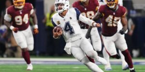 Prescott gooit 4 TD-passes terwijl Cowboys Commanders verslaan, die Daniels opnieuw verliezen door een ontwrichte elleboog
