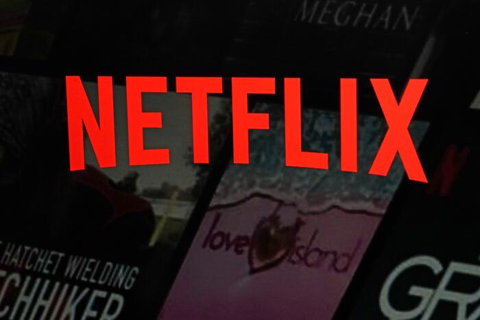 Netflix boekt een hogere winst in het derde kwartaal, maar zorgen over de omzetgroei trekken de aandelen omlaag